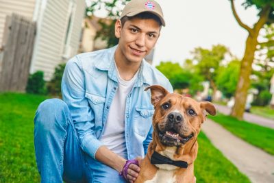 Happy adopted pet with people